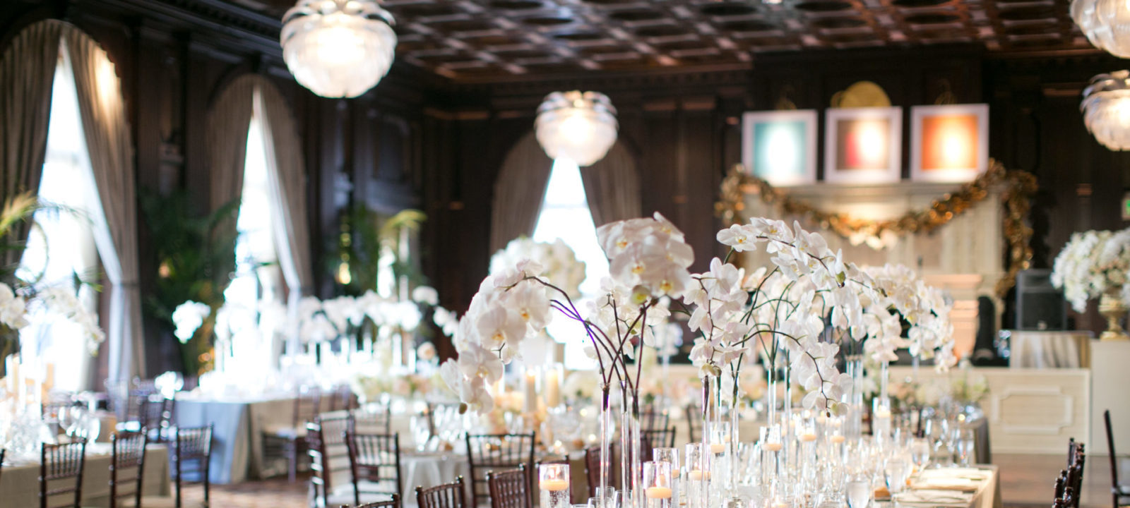 Julia Morgan Ballroom in San Francisco dressed for a wedding with ornate historic architecture and warm lighting